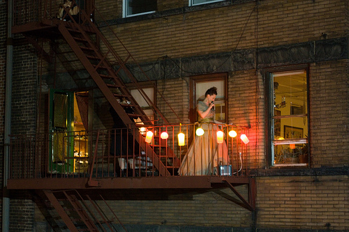 Fkickr image: Elizabeth Soychak sings the first, of what I'm sure will be many, High Line fire escape performances.